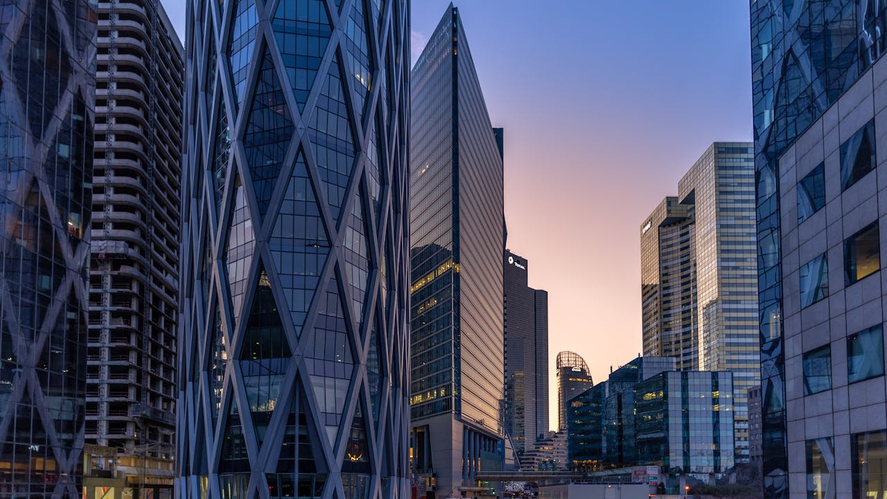 About Capture of modern skyscrapers in Paris during sunset, showcasing urban architecture.